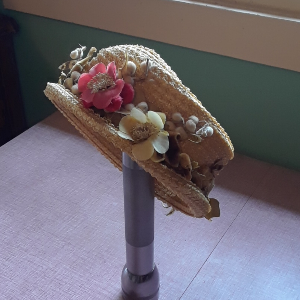 Vintage straw hat with flowers